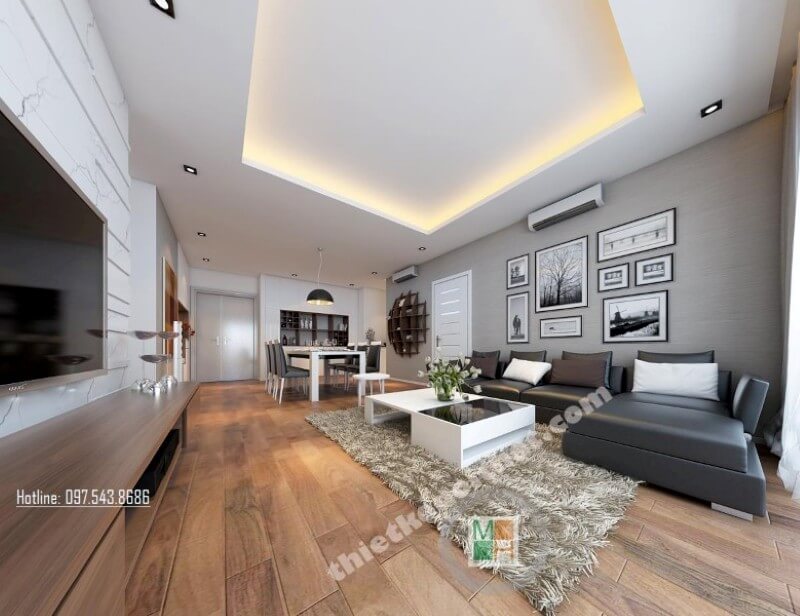 Khu vực phòng khách được sắp xếp hài hòa, khéo léo, 2 tone màu trắng và đen đóng vai trò chủ đạo được kiến trúc sư lồng ghép tinh tế mang lại không gian tiếp khách thêm phần sang trọng hơn Các ý tưởng thiết kế phòng khách sang trọng và cao cấp