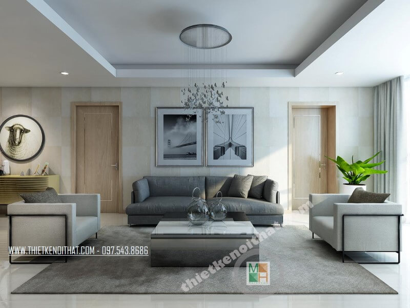 Mẫu thiết kế phòng khách chung cư đẹp với bộ sofa bọc vài màu xám và trắng tạo điểm nhấn nổi bật cho căn phòng. ‘Thiết