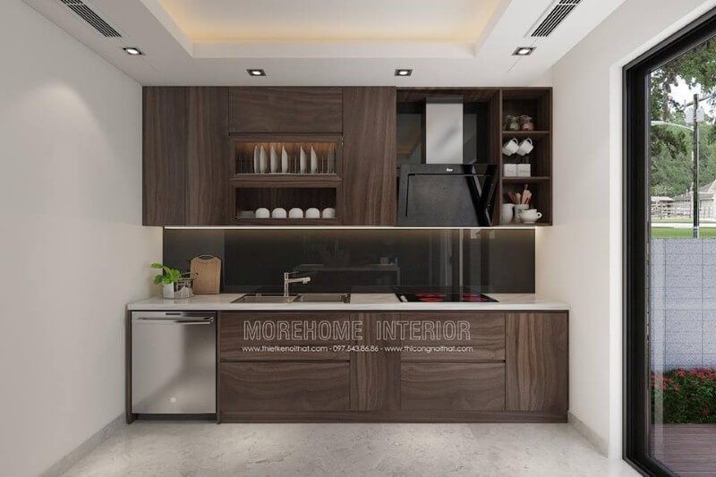Mẫu tủ bếp gỗ công nghiệp veneer với màu sắc tối màu đẹp, sang trọng sẽ làm nổi bật không gian bếp hiện đại.
