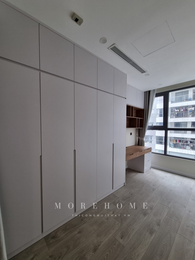 Thi công kệ tủ treo tường gỗ công nghiệp hiện đại sắp xếp trưng bày những món đồ những cuốn sách gọn gàng khoa học