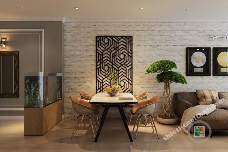 Bàn ăn gỗ công nghiệp được thiết kế liên kết trực tiếp với phòng khách, không có bất kỳ vách ngăn nào để tạo ra sự trở mật và liên kết cho không gian.